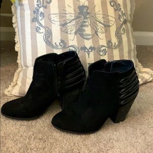 Black short heel boot.